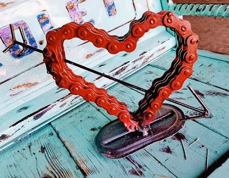 Recycled scrap chain made into a heart.