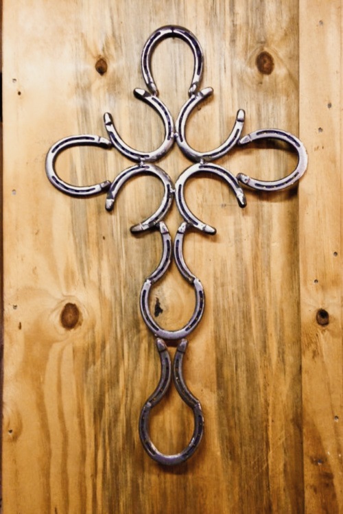 Simple cross project made from welded horseshoes.
