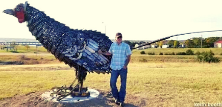 Metal pheasant sculpture made out of welded railroad spikes
