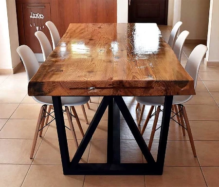 Metal base with wood top dining table