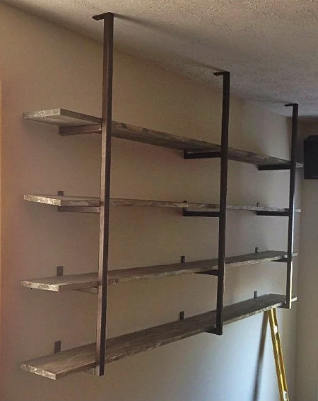 Industrial style wood and metal wall shelving 